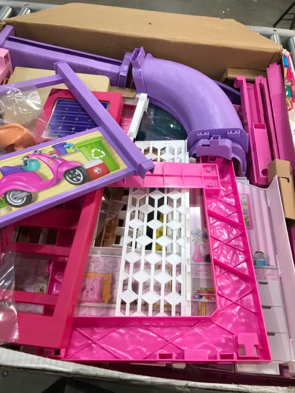 Photo 3 of Barbie Dreamhouse Dollhouse with Wheelchair Accessible Elevator, Pool, Slide and 70 Accessories Including Furniture and Household Items, Gift for 3 to 7 Year Olds
