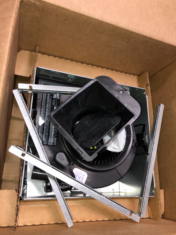 Photo 1 of Broan-NuTone Roomside Series 110 CFM Ceiling Bathroom Exhaust Fan with CleanCover Energy Star