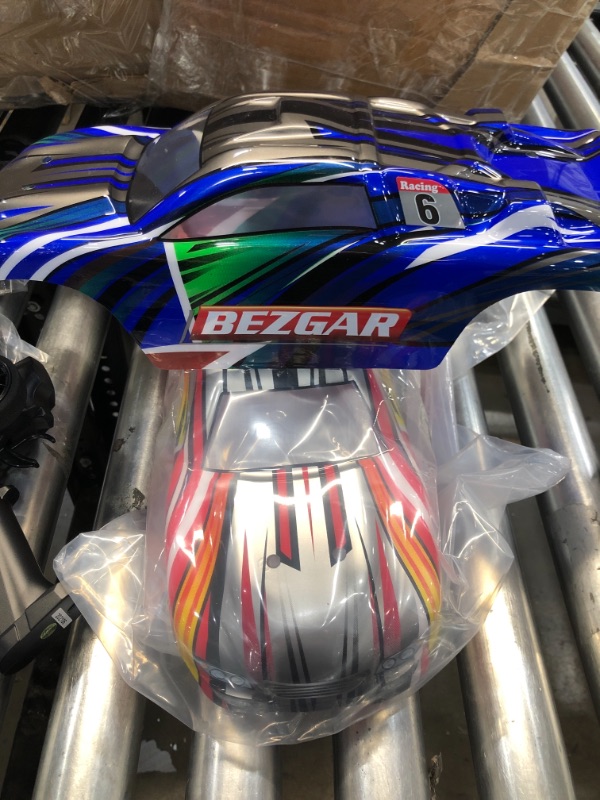 Photo 6 of DOES NOT HAVE THE PINS TO HOLD DOWN PLASTIC BODY***BEZGAR HM102 1/10 Scale Brushless RC Cars, 4WD High Speed 68 Km/h All Terrains Off Road RC Monster Truck, Hobby Grade Remote Control Car with Rechargeable Battery 
