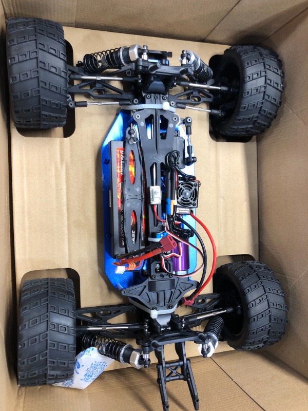 Photo 2 of DOES NOT HAVE THE PINS TO HOLD DOWN PLASTIC BODY***BEZGAR HM102 1/10 Scale Brushless RC Cars, 4WD High Speed 68 Km/h All Terrains Off Road RC Monster Truck, Hobby Grade Remote Control Car with Rechargeable Battery 
