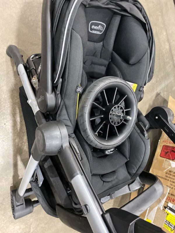 Photo 2 of Evenflo Pivot Xpand Modular Travel System with SafeMax Infant Car Seat
