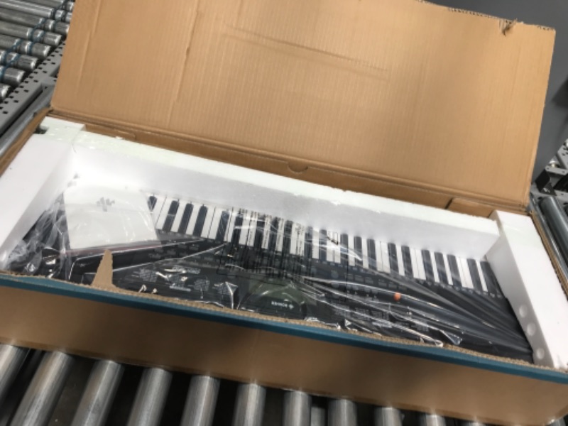 Photo 2 of Donner Keyboard Piano, 61 Key Piano Keyboard for Beginner/Professional, Electric Piano with Music Stand, Microphone and Piano App, Supports MP3/USB MIDI/Audio/Microphone/Headphones/Sustain Pedal
