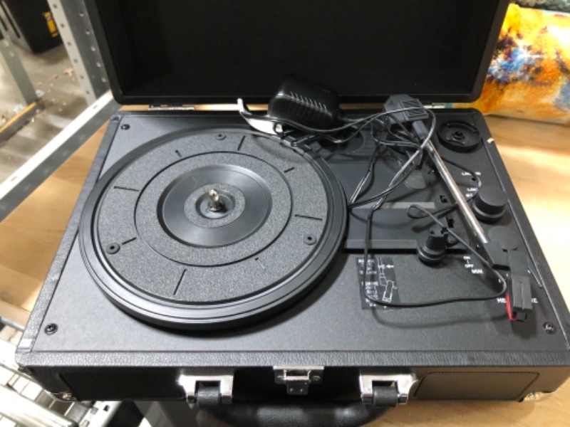 Photo 4 of Victrola Vintage 3-Speed Bluetooth Portable Suitcase Record Player with Built-in Speakers Upgraded Turntable Audio Sound Includes Extra Stylus Black***LOCK IS DAMAGED /BACK PART  HAS DAMAGE AS SHOWN IN THE PICTURE *** 