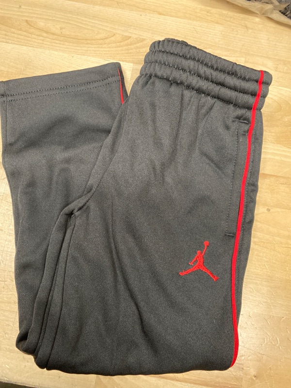 Photo 2 of Jordan Little Boys' Air Jumpman Therma-Fit Sweatpants (5, Black/Red Pin Stripe)