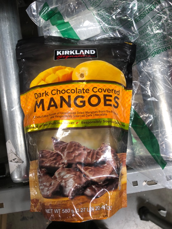 Photo 2 of **expire date: 2/6/23**NON REFUNDABLE** Kirkland Dark Chocolate Covered Mangoes 20.46 oz
