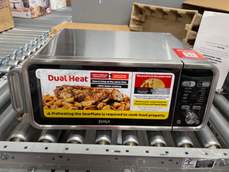 Photo 2 of Ninja SP301 Dual Heat Air Fry Countertop 13-in-1 Oven with Extended Height, XL Capacity, Flip Up & Away Capability for Storage Space, with Air Fry Basket, SearPlate, Wire Rack & Crumb Tray, Silver
