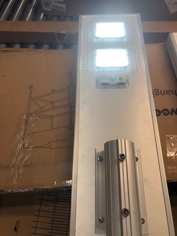 Photo 1 of Commercial Solar Street Light, 10000LM Outdoor LED Street Lights Dusk to Dawn with Motion Sensor and Remote Control, IP65 Waterproof Solar Parking Lot Light for Highway, Community
