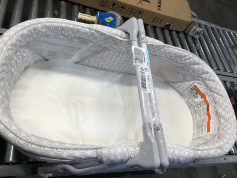 Photo 3 of Delta Children EZ Fold Ultra Compact Travel Bassinet
