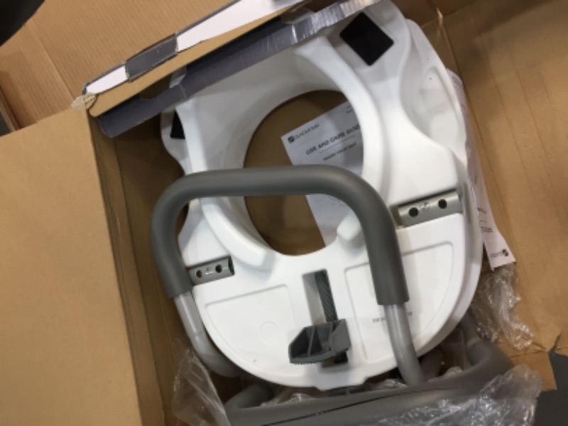 Photo 2 of E-Z Lock Raised Toilet Seat With Adjustable Armrests, 5 in.
**DAMAGED CUT HANDLE**