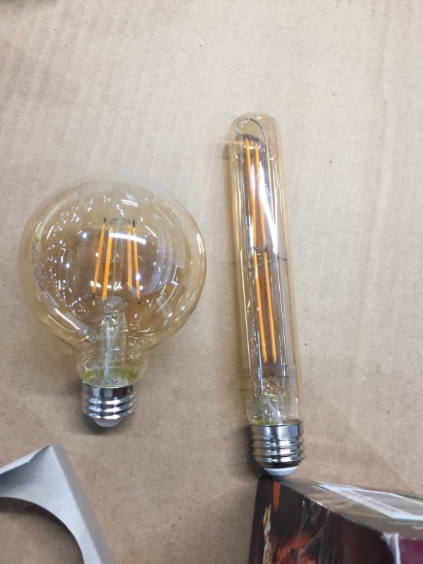 Photo 4 of BUNDLE, SET OF 2  Philips 40-Watt Equivalent G25 Dimmable Vintage Glass Edison LED Globe Light Bulb Amber Warm White (2000K) (1-Bulb)
AND, SET OF 4 Philips 40-Watt Equivalent T10 Dimmable Vintage Glass Edison LED Light Bulb Amber Warm White (2000K) (1-Bul