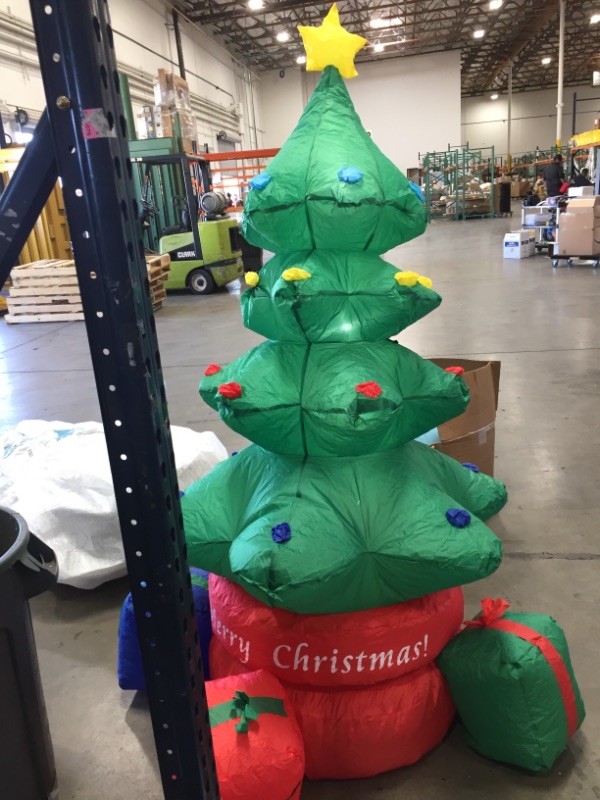 Photo 3 of **USED** Kyerivs 7 FT Christmas Inflatable Christmas Tree Indoor Outdoor Inflatable Christmas Decorations with Built-in LEDs Christmas Blow up Decor for Yard Lawn Patio Garden Xmas Holiday Party
