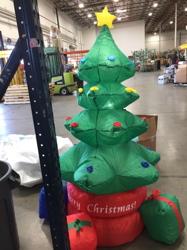 Photo 2 of **USED** Kyerivs 7 FT Christmas Inflatable Christmas Tree Indoor Outdoor Inflatable Christmas Decorations with Built-in LEDs Christmas Blow up Decor for Yard Lawn Patio Garden Xmas Holiday Party
