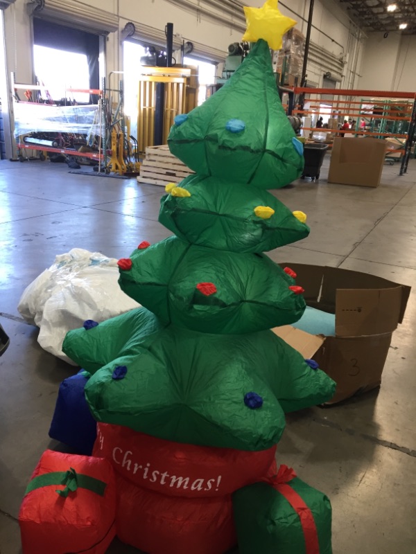 Photo 4 of **USED** Kyerivs 7 FT Christmas Inflatable Christmas Tree Indoor Outdoor Inflatable Christmas Decorations with Built-in LEDs Christmas Blow up Decor for Yard Lawn Patio Garden Xmas Holiday Party
