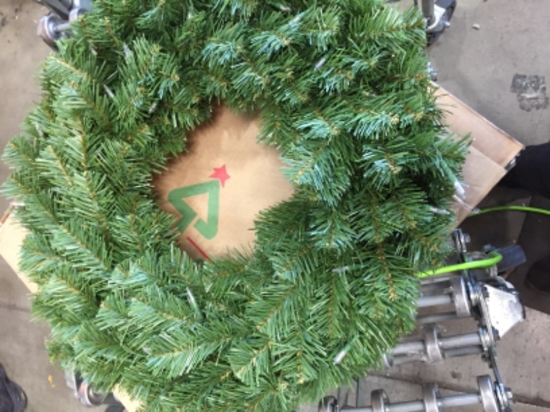 Photo 3 of National Tree 24 North Valley Spruce Wreath with 50 Battery Operated Dual LED Lights - Green
***requires batteries***snap for a battery case is broke, see pictures***