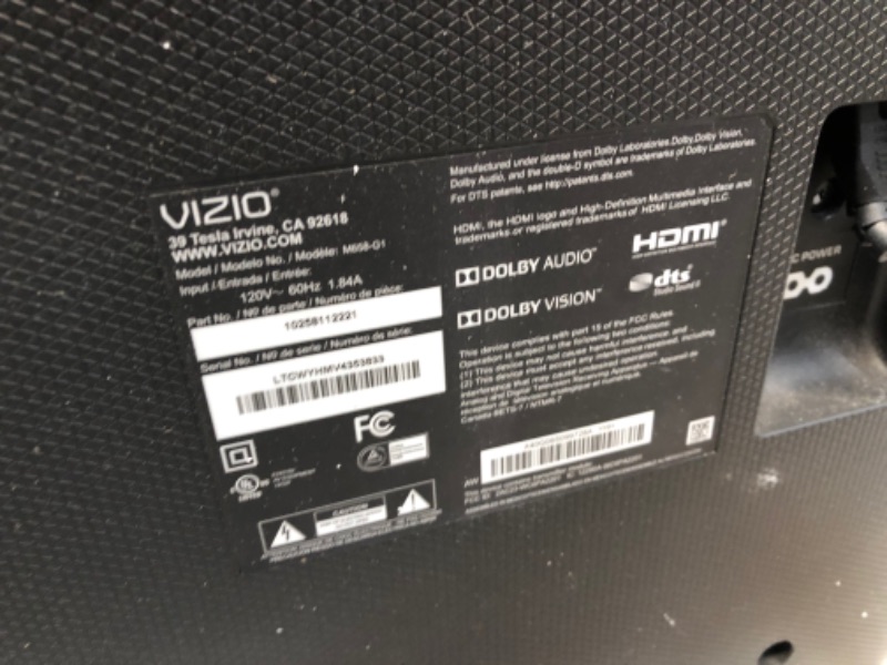 Photo 4 of VIZIO M658-G1 M-Series Quantum 65” 4K HDR Smart TV
in an LG box and has an LG tv mount