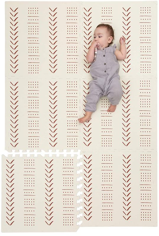 Photo 1 of 
Roll over image to zoom in
Visit the CHILDLIKE BEHAVIOR Store
Childlike Behavior Baby Play Mat - Extra Large, Non-Toxic Foam Play Mat with Soft Interlocking Floor Tiles 72x48 Inches - Baby Floor Mat for Infants, Toddlers and Kids (Mudcloth - Beige)