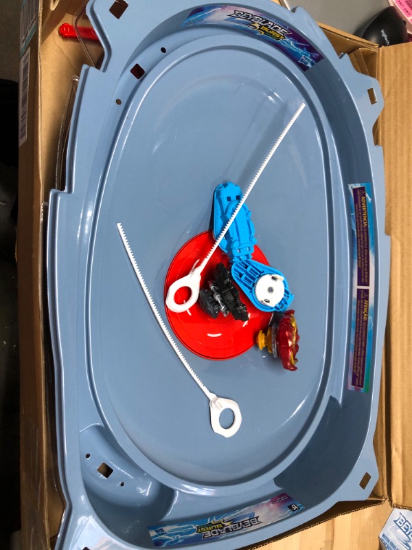 Photo 4 of BEYBLADE Burst Surge Speedstorm Motor Strike Battle Set -- Battle Game playset with Motorized Stadium, 2 Battling Top Toys and 2 Launchers
