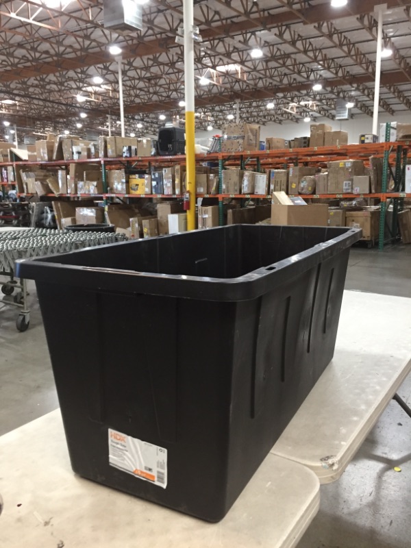 Photo 2 of 55 Gal. Tough Storage Tote in Black with Yellow Lid
AS IS USED, DAMAGED, MISSING LID, PLEASE SEE PHOTOS 