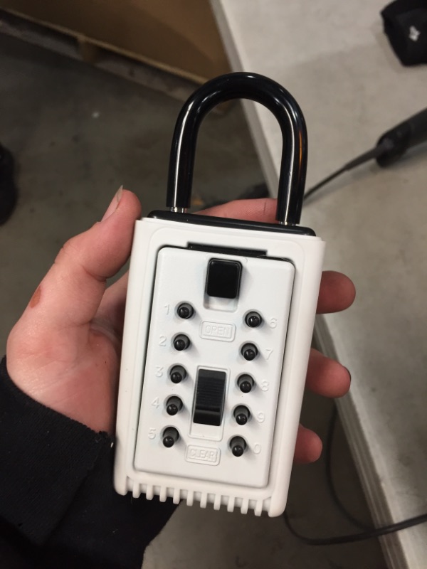 Photo 1 of Mounted 2-Key Lock Box with Pushbutton Combination Lock
AS IS USED, COULDNT OPEN CASE 