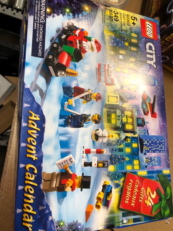 Photo 2 of LEGO City Advent Calendar 60303 Building Kit; Includes City Play Mat; Best Christmas Toys for Kids; New 2021 (349 Pieces)
