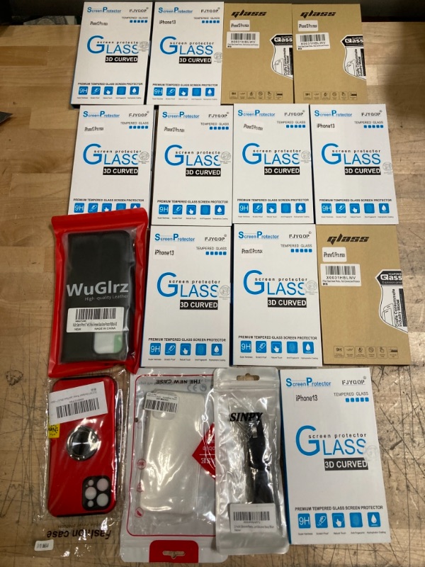 Photo 1 of NON- REFUNDABLE 

ASSORTED iPhone Products; 11/12/13 cases and screen protectors with phone accessories 