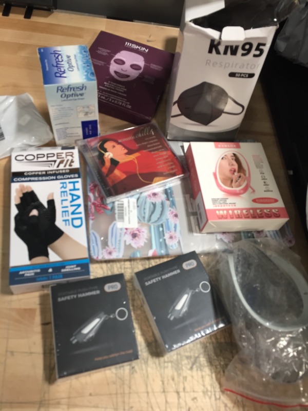 Photo 1 of **NOT REFUNDABLE** BUNDLE OF ASSORTED ITEMS (MASK,LAPTOP COVER, KEYCHAIN CLIPS, ETC..)