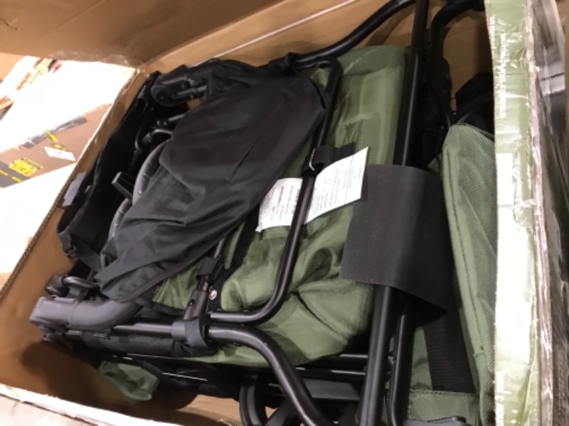 Photo 4 of **USED, MISSING SOME WHEELS**
Jeep Deluxe Wrangler Stroller Wagon by Delta Children - Includes Cooler Bag, Parent Organizer and Car Seat Adapter, Black/Green
