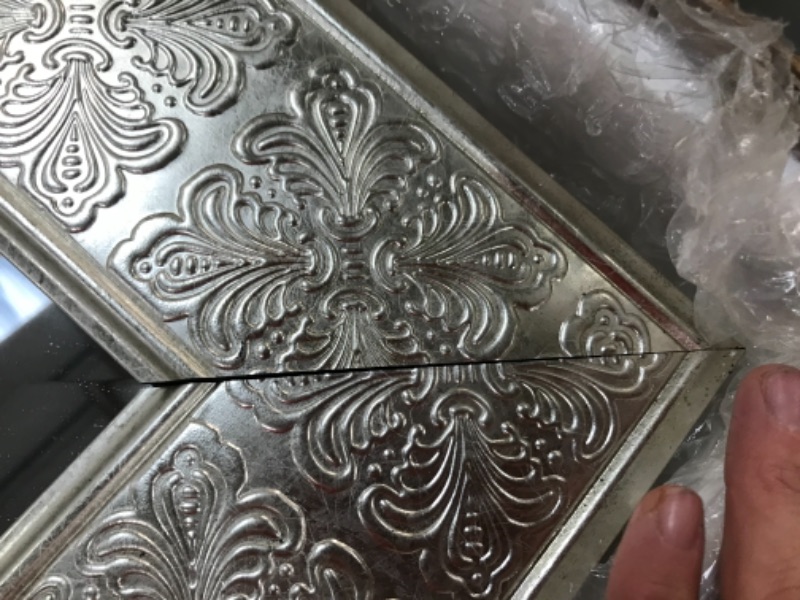 Photo 1 of **ONE CORNER OF MIRROR IS LOOSE BUT STILL INTACT**
MCS 24x36 Inch Stamped Medallion Wall Mirror, 32x44 Inch Overall Size, Champagne Silver (47700), 32 by 44-Inch
