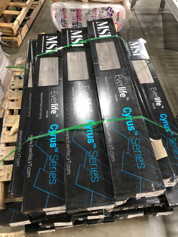 Photo 5 of **SOLD AS IS** PALLET OF 55 MSI HOLDEN HENSLEE VINYL CASES** SOME VINYL PLANKS ARE EXPOSED AND CHIPPED **
MSI Holden Henslee 7.13 in. x 48.03 in. Luxury Vinyl Plank Flooring (23.77 sq. ft. / case)
