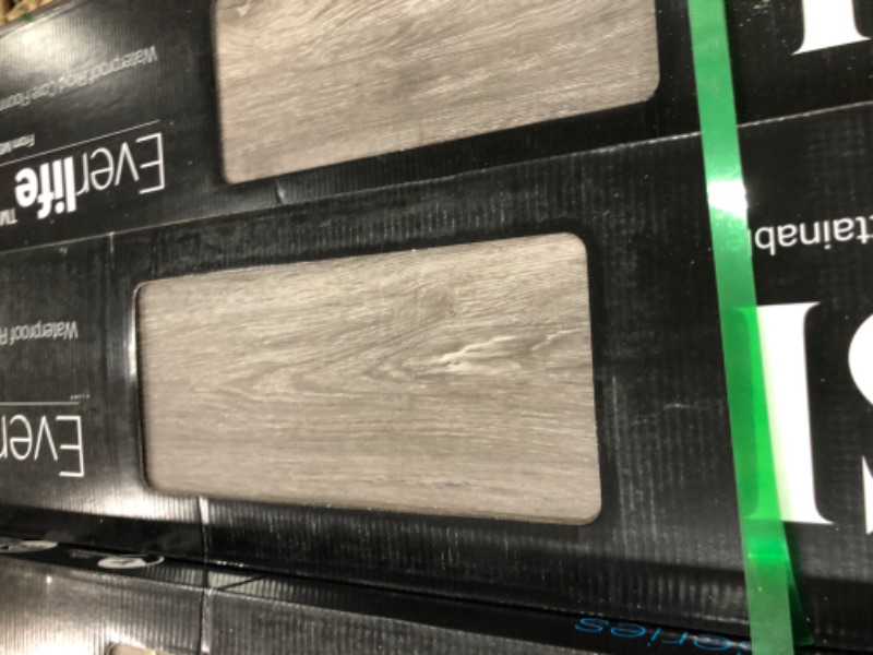 Photo 4 of **SOLD AS IS** PALLET OF 55 MSI HOLDEN HENSLEE VINYL CASES** SOME VINYL PLANKS ARE EXPOSED AND CHIPPED **
MSI Holden Henslee 7.13 in. x 48.03 in. Luxury Vinyl Plank Flooring (23.77 sq. ft. / case)
