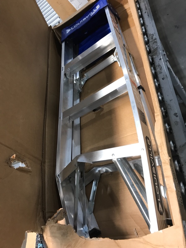 Photo 2 of *DAMAGED* Louisville Ladder 4-Foot Aluminum Step Ladder, 250-Pound Capacity, AS2104 BENT AT BOTTOM NEEDS REPAIR.
