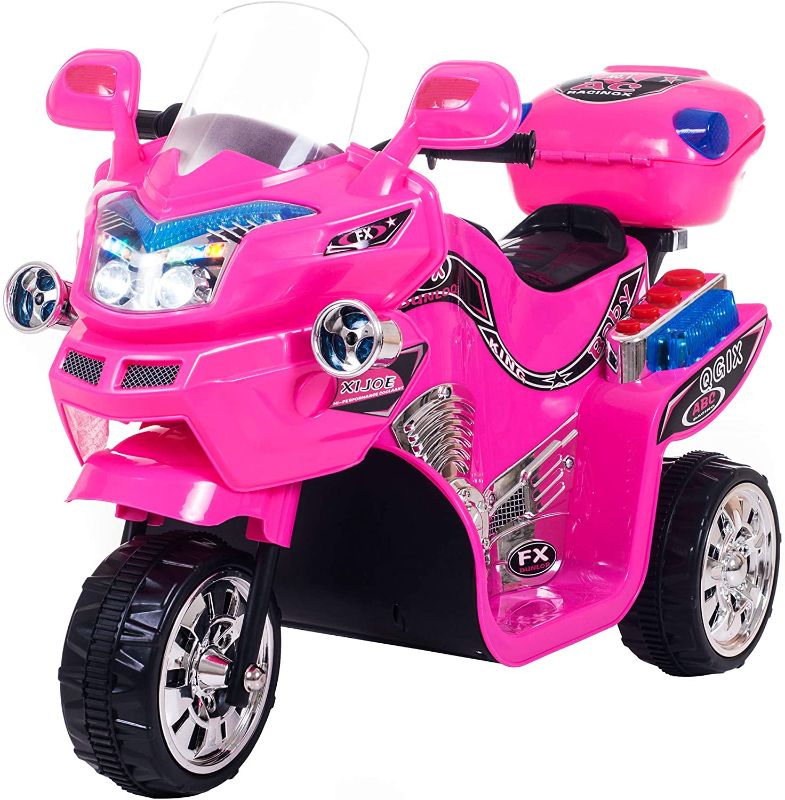 Photo 1 of Electric Motorcycle for Kids – 3-Wheel Battery Powered Motorbike for Kids Ages 3 -6 – Fun Decals, Reverse, and Headlights by Lil’ Rider (Pink)
