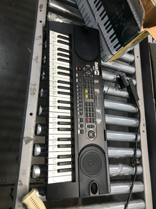 Photo 2 of RockJam (RJ549) 49-Key Portable Electric Keyboard Piano With Power Supply, Sheet Music Stand and Simply Piano App

//powers on