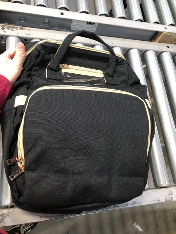 Photo 1 of ESTB black and gold bag