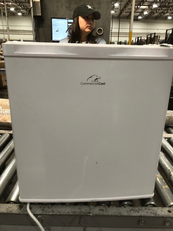 Photo 2 of **DAMAGED**, **WON'T START**, **PARTS ONLY**

Commercial Cool CCUK12W 1.2 Cu. Ft. Upright Freezer with Adjustable Thermostat Control and R600a Refrigerant, White