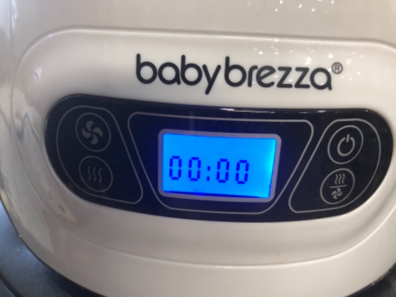 Photo 3 of Baby Brezza Baby Bottle Sterilizer and Dryer Machine – Electric Steam Sterilization - Universal Fit - Pacifiers, Glass, Plastic, and Newborn Feeding Bottles
