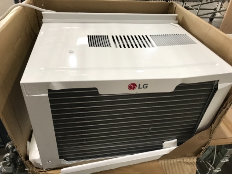 Photo 2 of LG 12,000 BTU 115V Window-Mounted Air Conditioner with Remote Control, White
