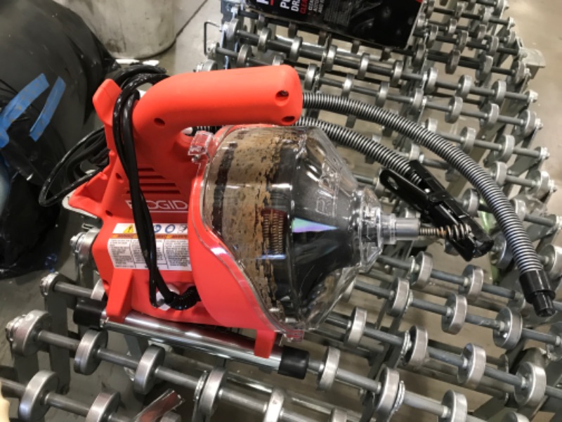 Photo 1 of Ridgid 55808 PowerClear Drain Cleaning Machine 120V Drain Cleaner Cleans Tub, Shower or Sink Blockages from 3/4" to 11/2" diameter, Red
