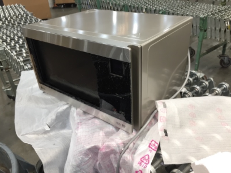 Photo 2 of *PARTS ONLY* NeoChef 1.5 cu. ft. Countertop Microwave in Stainless Steel with Smart Inverter 
FRONT GLASS IS BROKEN
