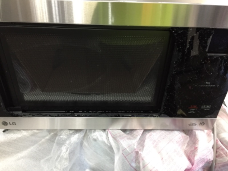 Photo 3 of *PARTS ONLY* NeoChef 1.5 cu. ft. Countertop Microwave in Stainless Steel with Smart Inverter 
FRONT GLASS IS BROKEN
