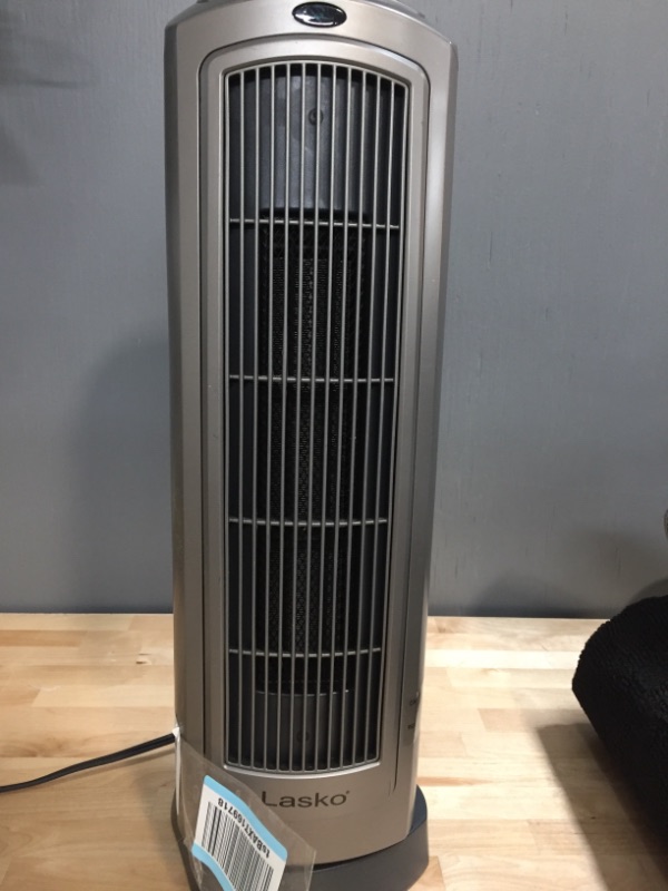 Photo 2 of Lasko 755320 Ceramic Space Tower Heater, 8.5?L x 7.25?W x 23?H, Silver
