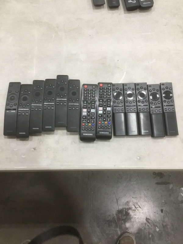 Photo 1 of Bundle of 13 assorted model Samsung smart TV remotes
Sold as is, nonrefundable