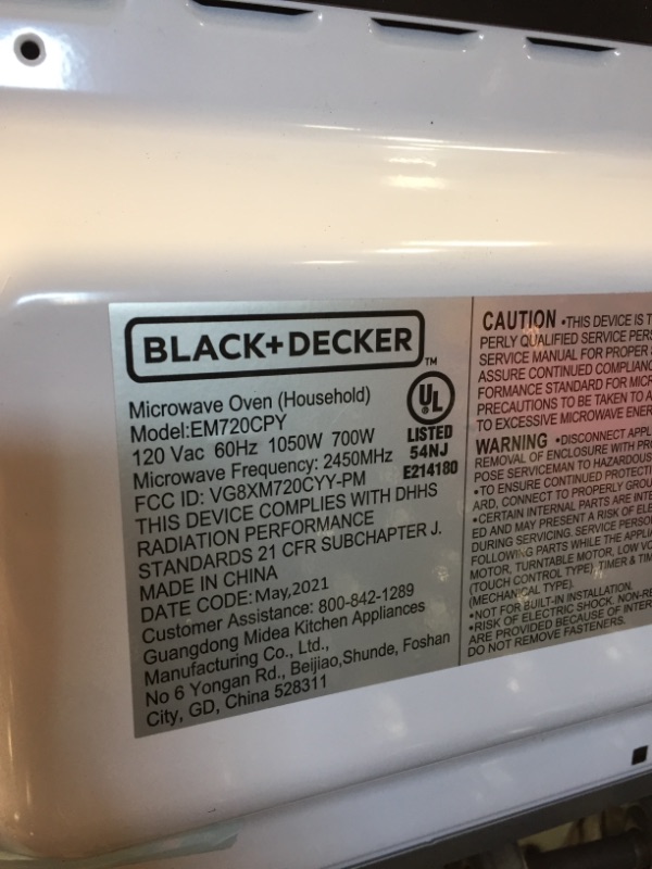 Photo 1 of Black+Decker EM720CB7 Digital Microwave Oven with Turntable Push-Button Door, Child Safety Lock, 700W, Stainless Steel, 0.7 Cu.ft

