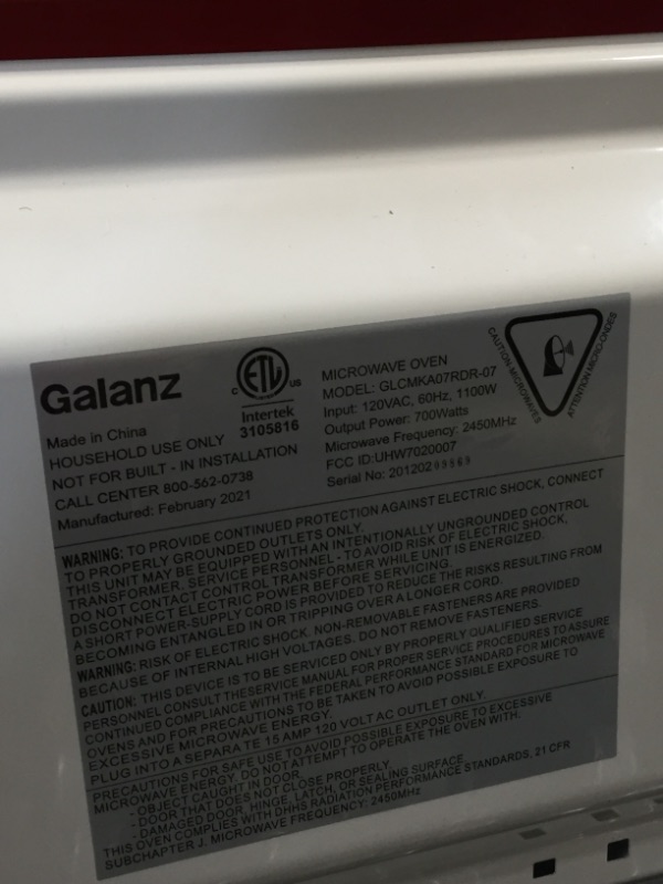 Photo 4 of Galanz GLCMKA07RDR-07 Microwave Oven, LED Lighting, Pull Handle Design, Child Lock,Retro Red, 0.7 Cu.Ft
NONFUNCTIONAL, BUT  MAY BE PARTED FOR PARTS, PLEASE SEE PHOTOS (PARTS ONLY) 