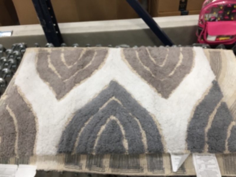 Photo 1 of Cotton Bath Mat Set- 2 Piece 100 Percent Cotton Mats- Reversible, Soft, Absorbent and Machine Washable Bathroom Rugs 
34.5" X 21" AND 41" X 23.5" 
AS IS USED, PLEASE SEE PHOTOS 