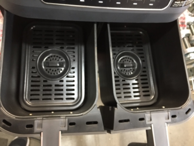 Photo 1 of Ninja DZ201 Foodi 8 Quart 6-in-1 DualZone 2-Basket Air Fryer with 2 Independent Frying Baskets, Match Cook & Smart Finish to Roast, Broil, Dehydrate & More for Quick, Easy Meals, Grey
