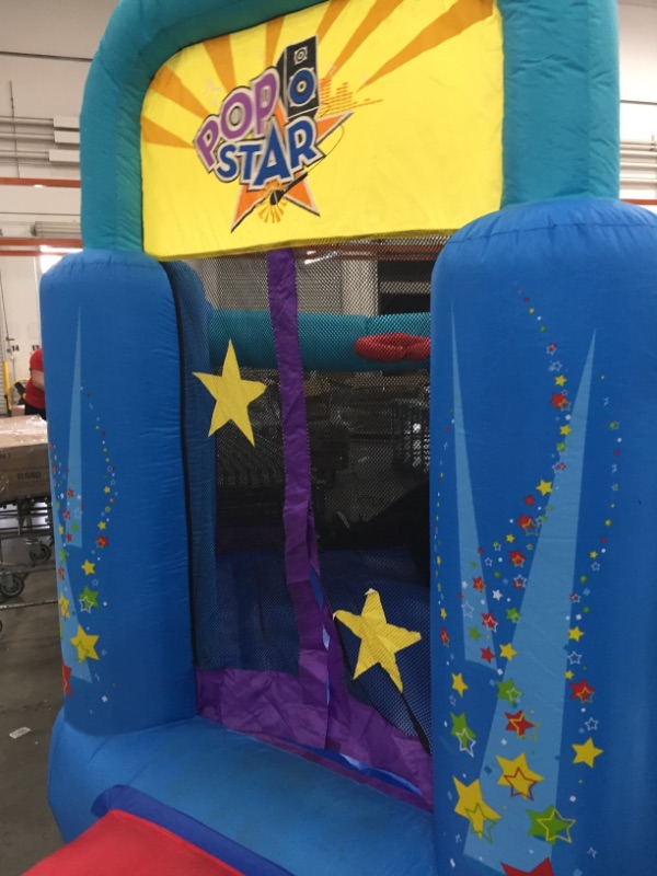 Photo 11 of Bounceland Pop Star Inflatable Bounce House Bouncer, Large Bouncing Area with Long Slide, Climbing Wall, Basketball Hoop, UL 1HP Blower Included, 15 ft x 13 ft x 8.3 ft H, Pop Star Kids Party Theme *** minor dirt markings***
