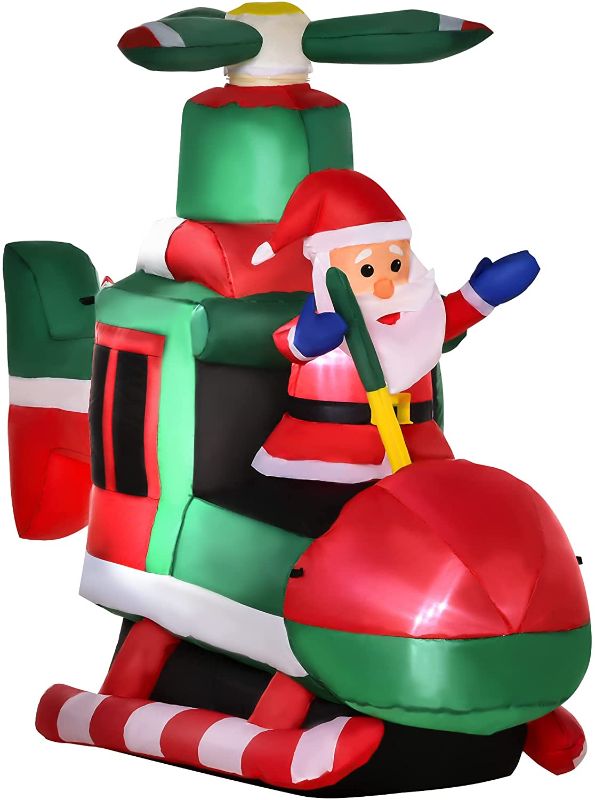 Photo 1 of inflateable satna claus on helicopter