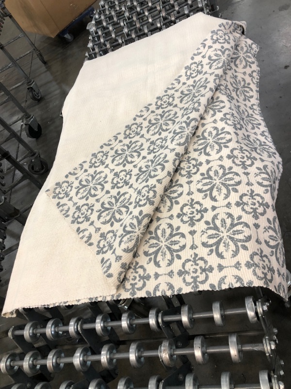 Photo 1 of 4 FT X 6 FT BIEGE AND GREY RUG