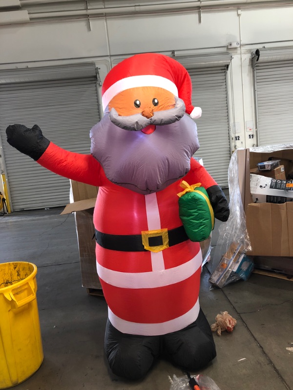 Photo 2 of 6.5 ft Pre-Lit LED Airblown Black Santa Christmas Inflatable
